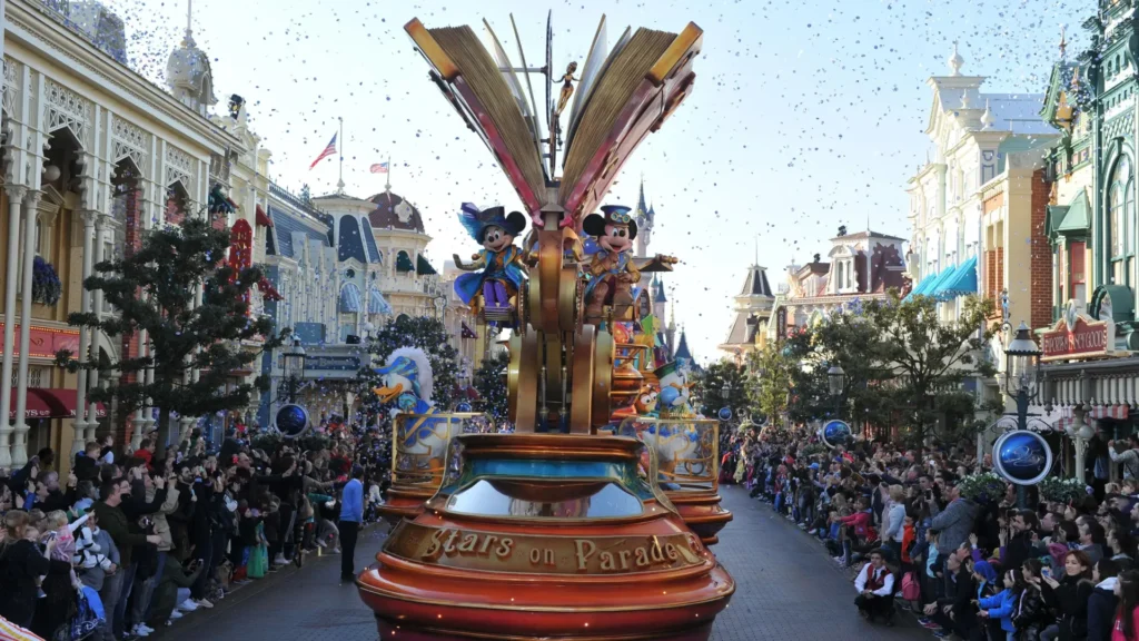 Disneyland Paris parade with characters • Disney stars on parade at Disneyland Paris • 4K video • Disney cartoon parade at Disneyland Paris.